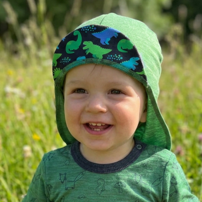 Glückskind Sonnenhut grün Dino limited edition, Merinowolle & Seide (bio/GOTS)