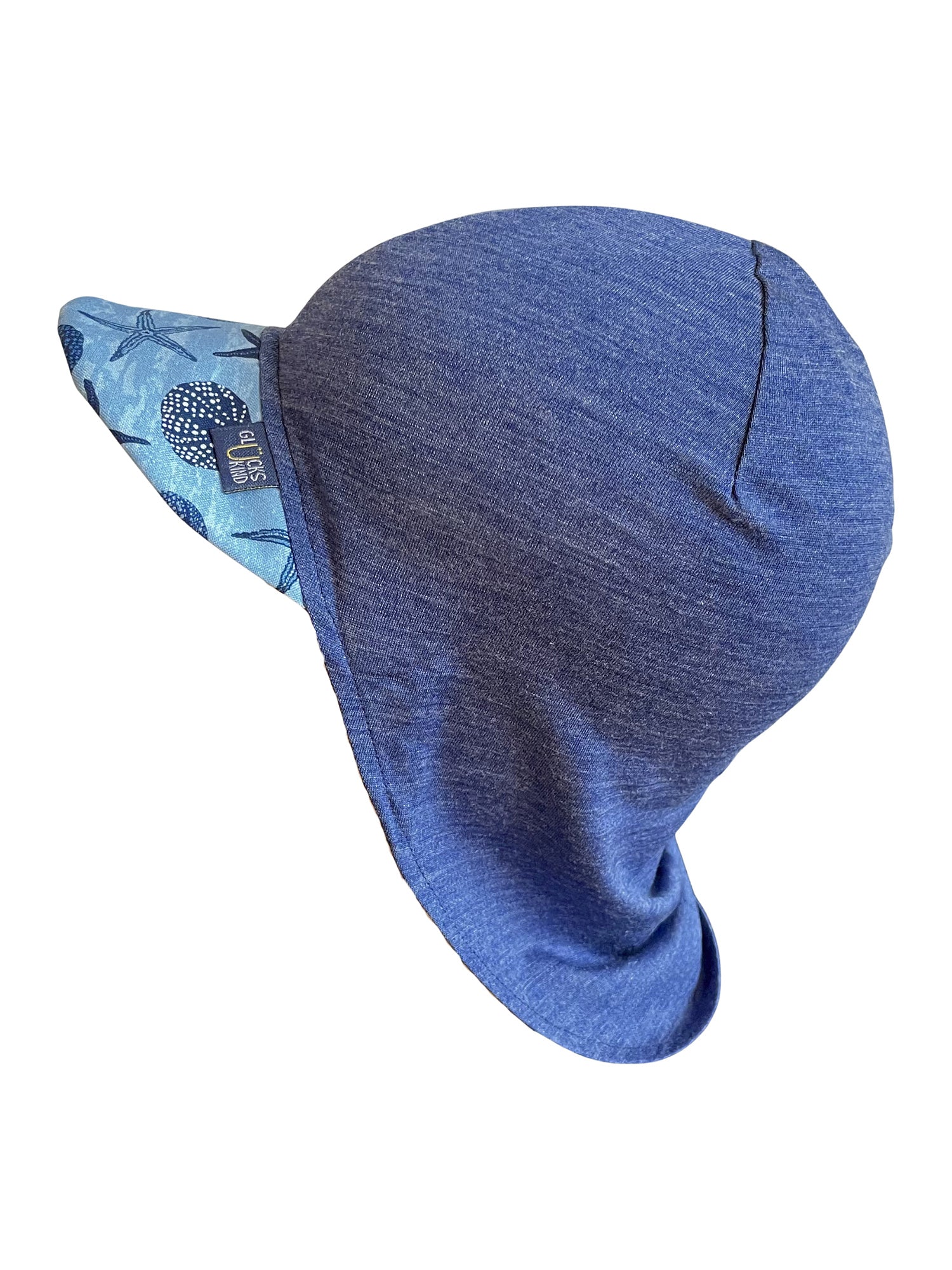 Original Glückskind Sommerkappe royal blau Seestern limited edition aus Merinowolle und Seide (bio/GOTS) - by heywool, Freisteller Seitenansicht #ay
